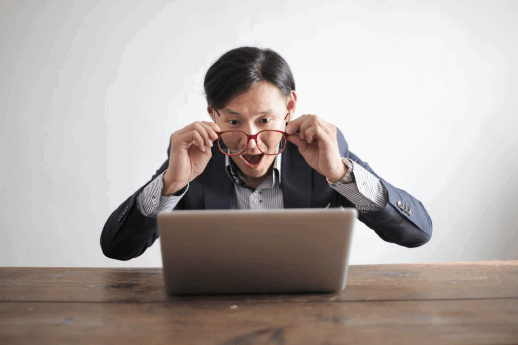 guy on computer excited