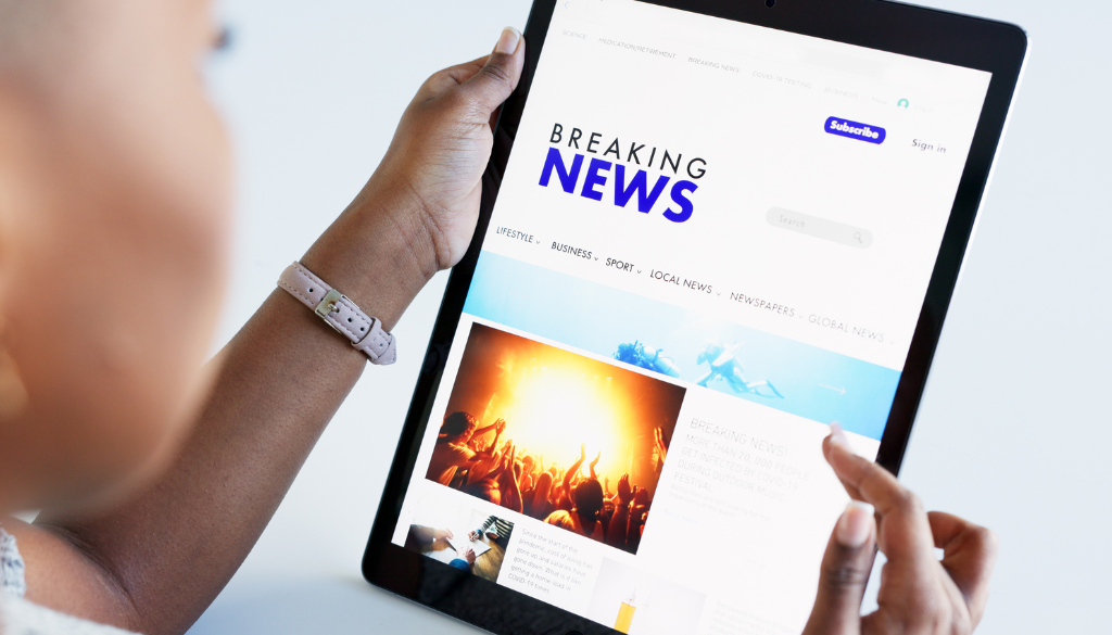 picture of someone on a tablet with a press release open