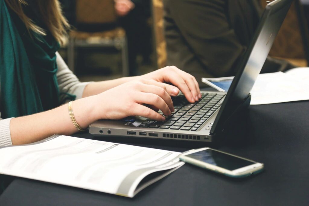 picture of a person on a computer writing